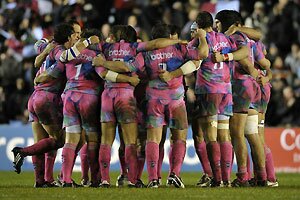 Stade Francais team hug